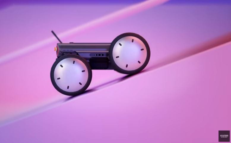 A high-performance Hyundai MobED CES 2026 autonomous mobility platform featuring eccentric wheel drive for professional logistics and lifestyle stability.