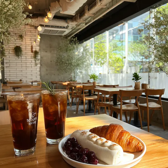 Iced Americano and bread on a table inside a Korean café in South Korea
